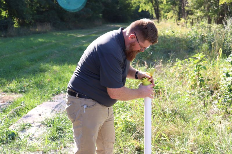 DSI Staff Members Checks Well