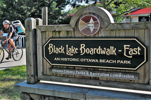 The Black Lake Boardwalk placard, which declares that this is an historic Ottawa Beach Park